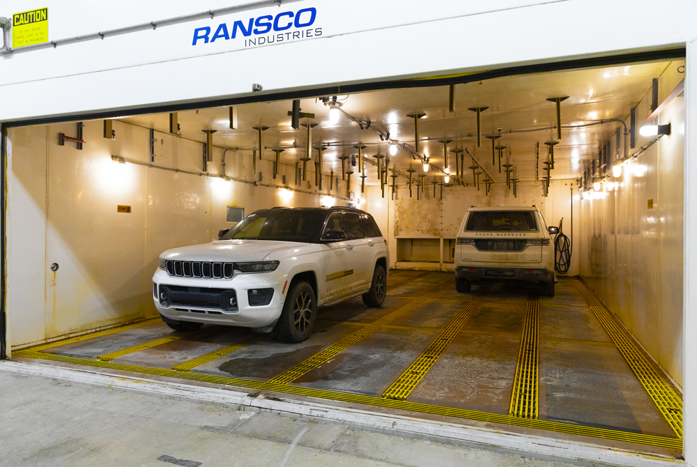 Two white Jeep Compass in the Corrosion Chamber