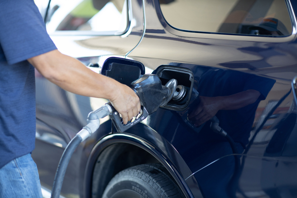 Image of a men with a fuel pump